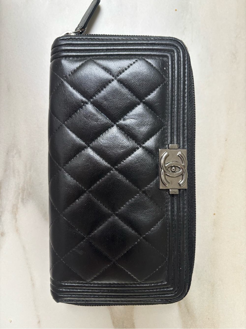 CHANEL Black Quilted Leather Zip-Around Wallet with Silver CC Accent